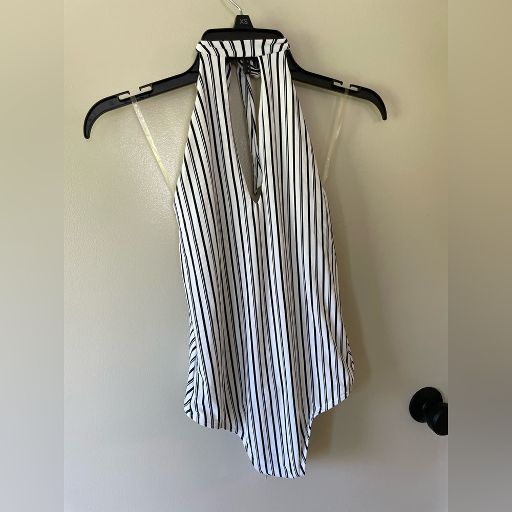 White and black stripped high neck halter one-piece swim suit from O’Neil.